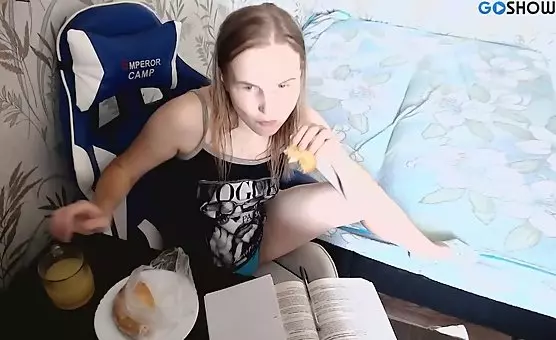 Naughty schoolgirl pleasures herself with tits out